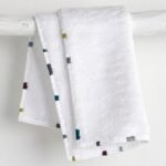 Serviette Invité Collection MEMBA finition aqua design V. Barkowski