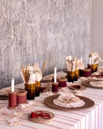 BALA table linen collection in ecru with carmine finish, design by V. Barkowski