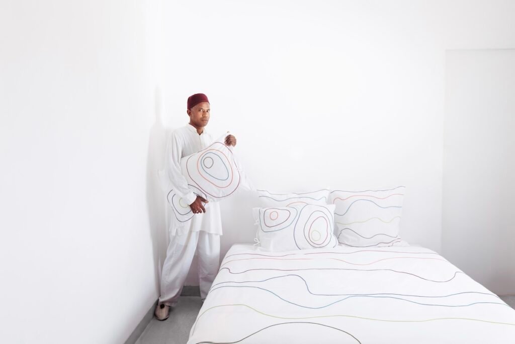 Abdelhadi and the new YOYO bed linen collection, design by Valérie Barkowski